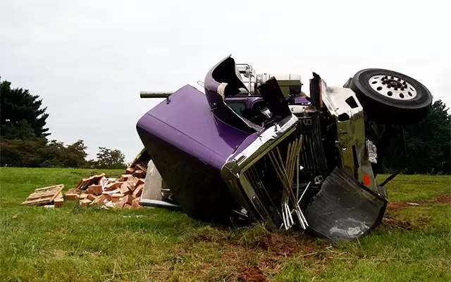 Dash cam captures flatbed truck driver driving recklessly down open drainage ditch