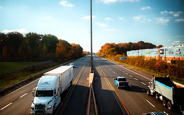 VIDEO: Heart-Stopping Moment Caught on Camera: Car Narrowly Avoids Double Crash with Two Trucks in Wisconsin
