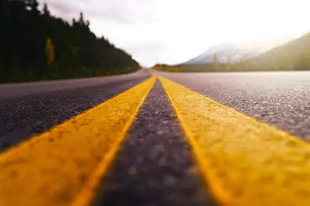VIDEO: Dangerous Dash Cam Video Shows Car Crossing Double Yellow Line to Overtake Semi in Rural Ohio